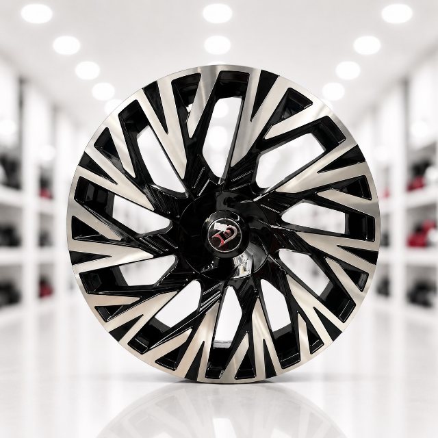 Black and machined-face alloy wheel with red center cap